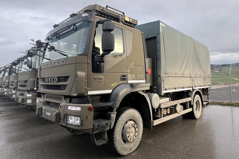 Row of Swiss Army Iveco trucks